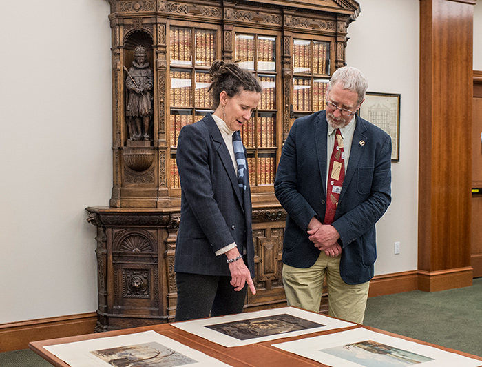 Pulitzer Prize–winning historians Elizabeth Fenn and Alan Taylor looking at items from The Huntington’s collections that informed their award-winning books. Photo by Martha Benedict.