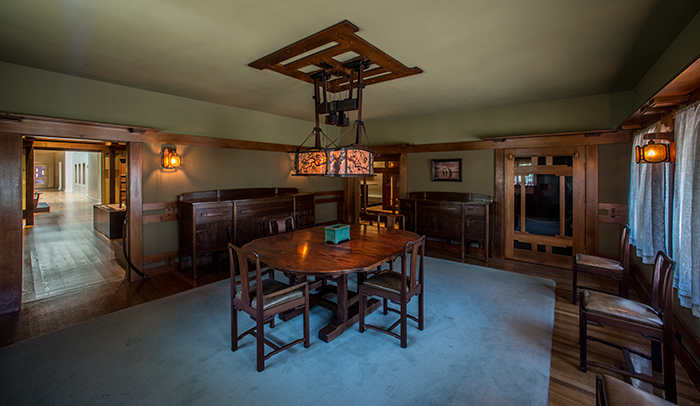 The dining room from the 1906 Robinson house now physically and visually connects with the Chandler Wing at the end of the hallway.