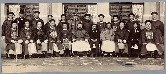 Hong Yen Chang, second row, far left, dressed in Western-style clothing and a bowler hat, at the time when he served as the accountant general to the Shanghai Bank treasury. The Huntington Library, Art Collections, and Botanical Gardens.