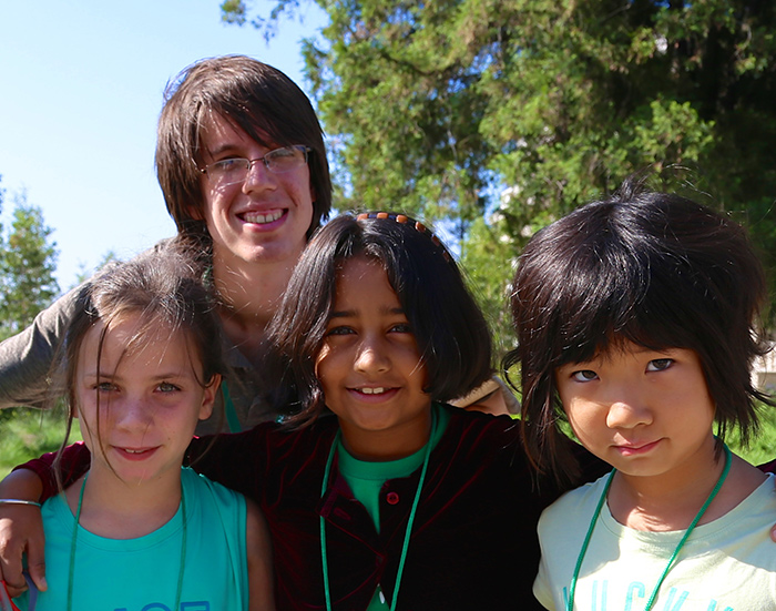 “I feel like I’m the link between the teachers and the kids,” says intern Connell Boken. He participated in Huntington Explorers as a child, and he was back as a classroom assistant this summer. Photo by Miso Kim.