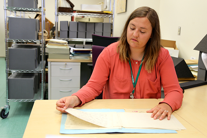 Intern Courtney Buchkoski worked in the Library with Huntington materials related to the Chinese in the American West. Photo by Miso Kim.