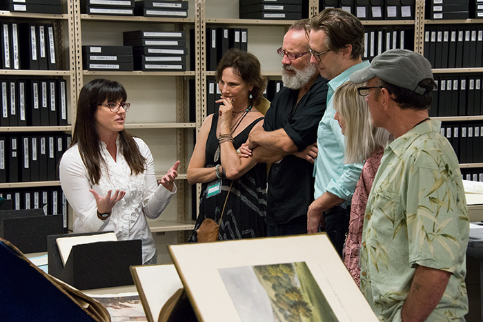 Vanessa Wilkie, William A. Moffett Curator of British Historical Manuscripts, shows visitors from A Noise Within Theatre Company selections from The Huntington’s collections relating to the production of Tom Stoppard’s play Arcadia. Left to right: Vanessa Wilkie, Susan Angelo, Geoff Elliott, Eric Curtis Johnson, Alicia Green, and Stephen Weingartner. The Huntington Library, Art Collections, and Botanical Gardens. Photo by Kate Lain.