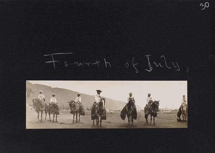 Women Pa’u riders on horseback and wearing traditional costumes, Kalaupapa, Molokai, July 4, 1907. Jack London Collection. The Huntington Library, Art Collections, and Botanical Gardens.