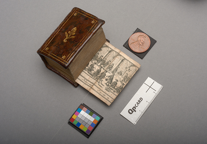 Kern der Nederlandische Historie, 1753, with the foldout illustration of a national synod council. Miniature books often employ foldout illustrations, using the form of the publication to underline the expansiveness of the contents. The Huntington Library, Art Collections, and Botanical Gardens.