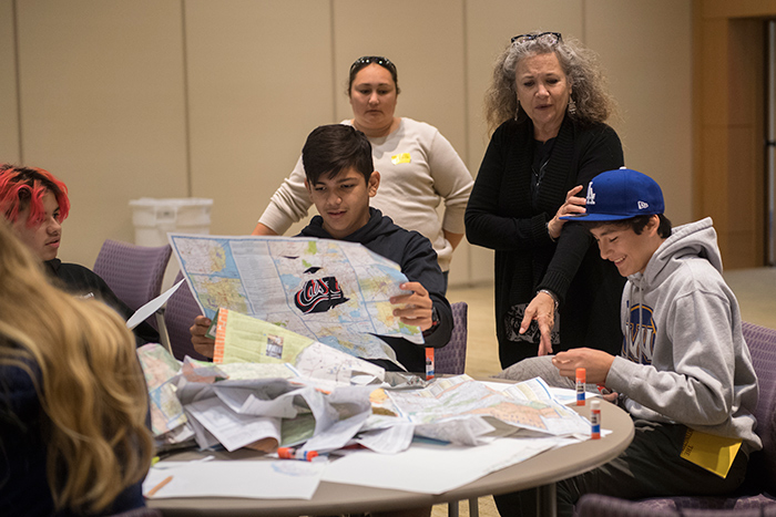 Denise Seider (second from right), an art educator at Eliot Arts Magnet Academy, leads an art-making project as part of a Visual Voyages Deep Learning Day at The Huntington. Photo by Martha Benedict.