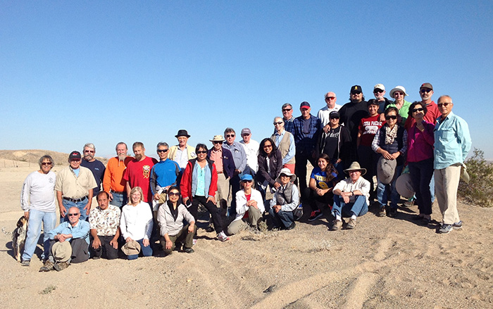 Members of the California Aiseki Kai posed for a group portrait this past November during a stone hunt in the Imperial Valley’s Yuha Desert. Photo by Nina Ragle.