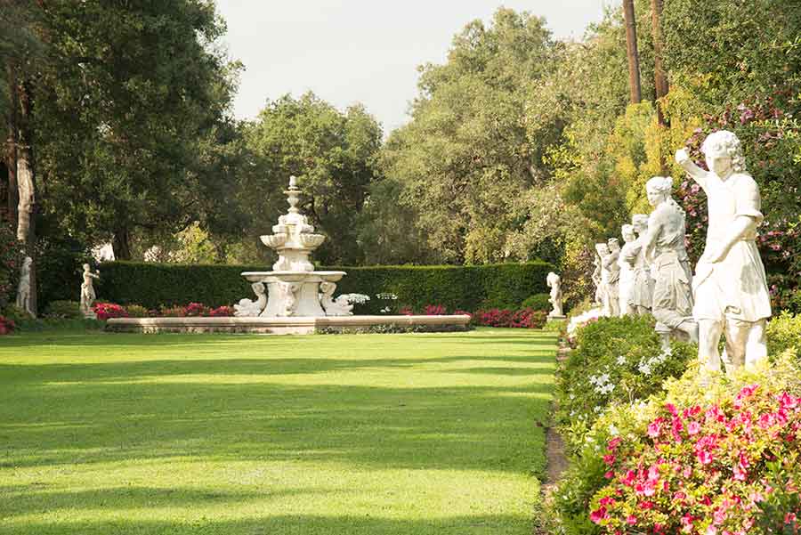 Venetian sculptures and Italian fountain in the North Vista. The Huntington Library, Art Museum, and Botanical Gardens. Photo by John Sullivan.