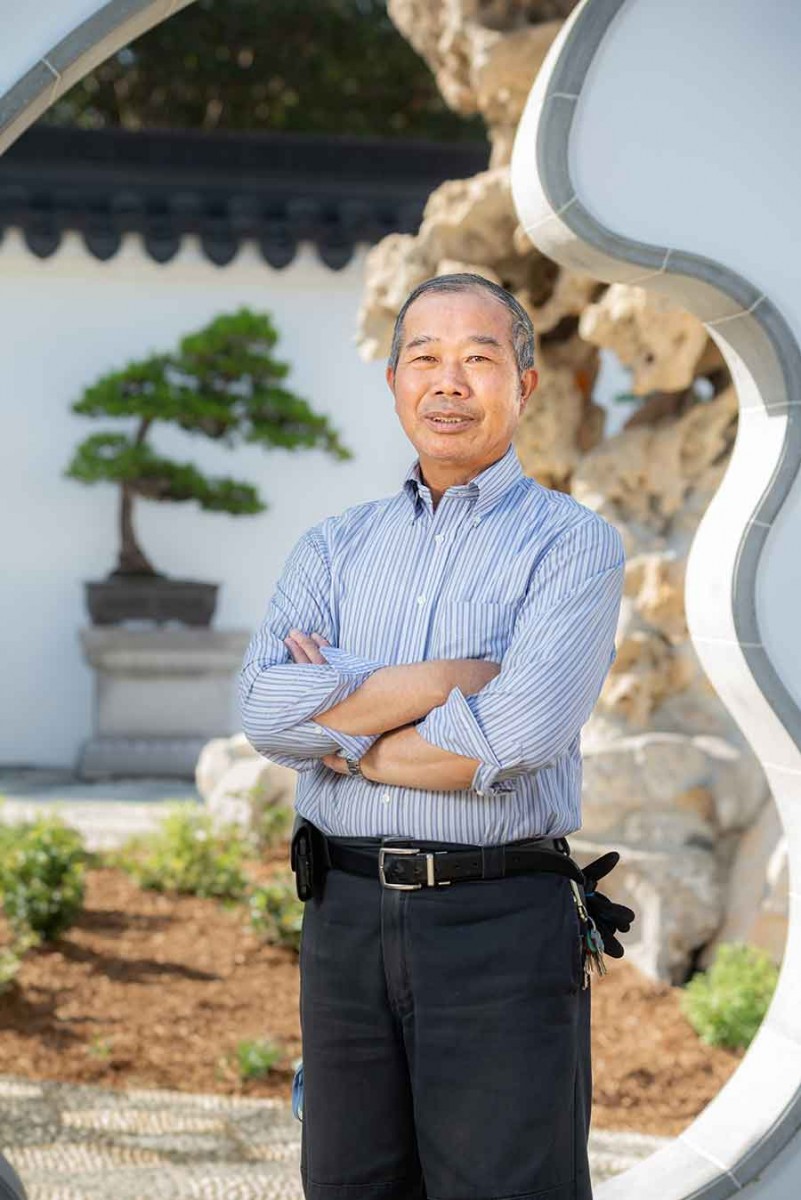 Che Zhao Sheng studied the art of penjing in his native China and has created many of the penjing now on display in The Huntington’s Chinese Garden. Photo by Jamie Pham.