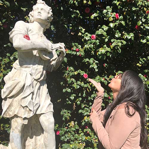 Posing in front of statue on the North Vista