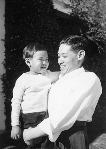 YC Hong holding his son Nowland